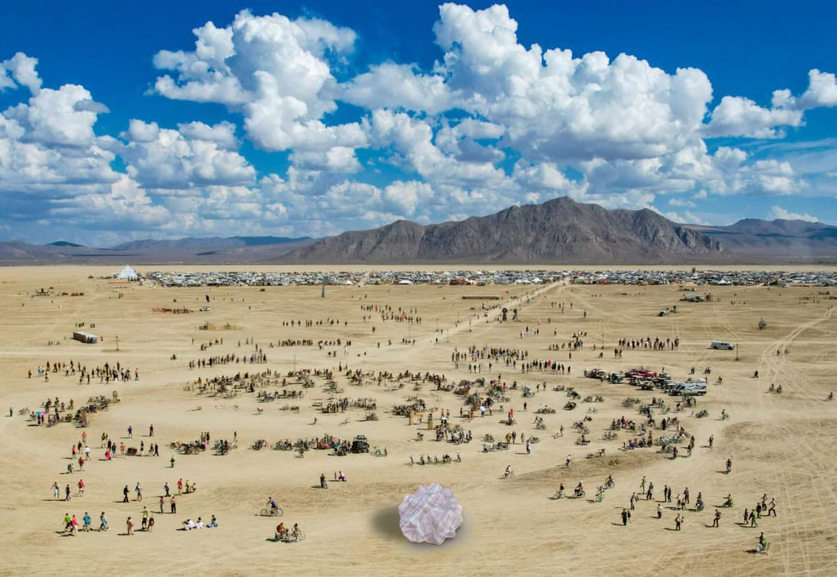 Nighttime render of the sculpture glowing on the playa